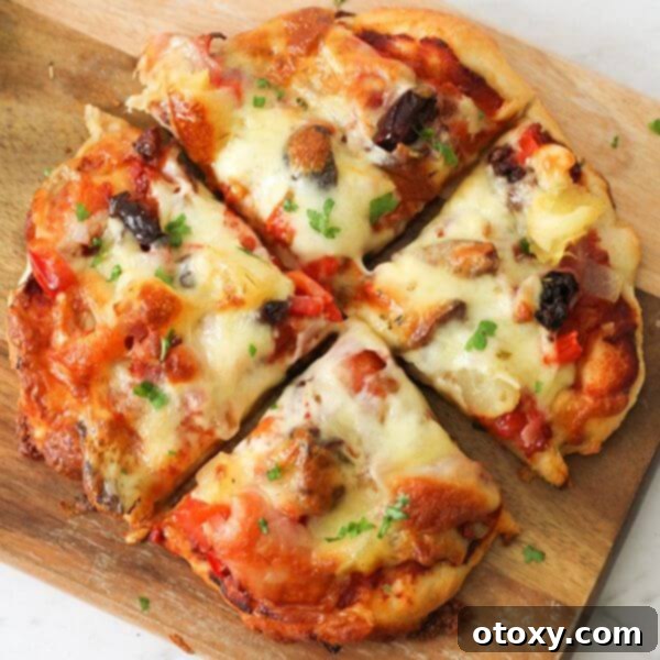 A mouthwatering homemade supreme pizza, loaded with classic toppings like pepperoni, ham, vegetables, and melted mozzarella.