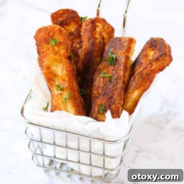 Golden brown crispy Halloumi Fries served with a dipping sauce.