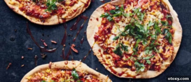 Delicious Halloumi Pizzas topped with Syrian red pepper muhummara.