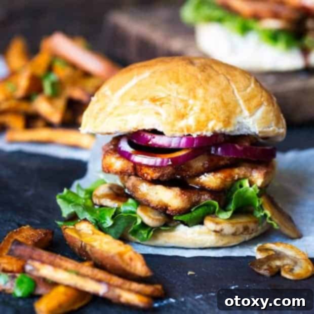 A delectable Halloumi Burger with Sticky Chilli Sauce, served in a bun.