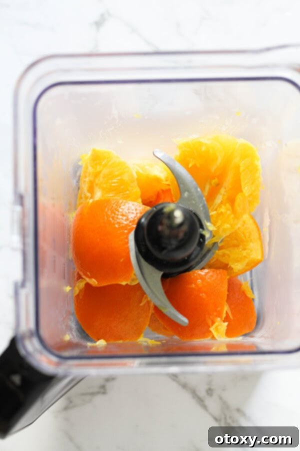 Zesty Orange Almond Tea Cakes 5 Step by step photo instructions showing chopped oranges, some peeled, some with skin, ready for blending.