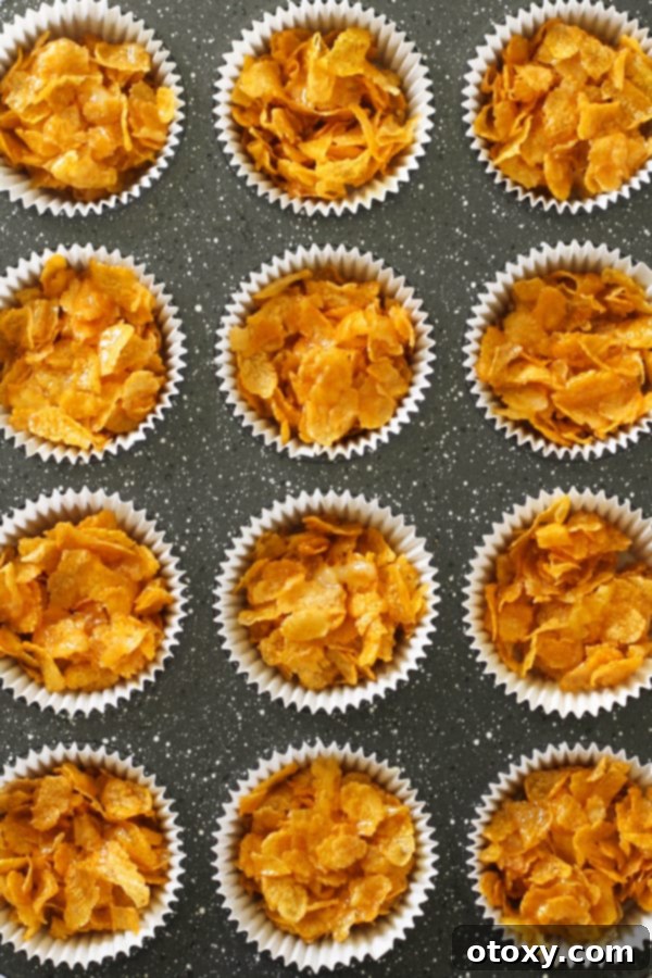 Honey joys in paper liners ready for the oven.