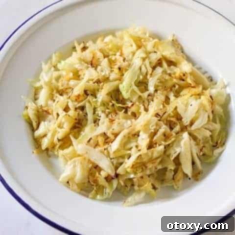 Crispy Pan-Fried Cabbage 6 Sautéed cabbage in a white bowl, ready for serving.