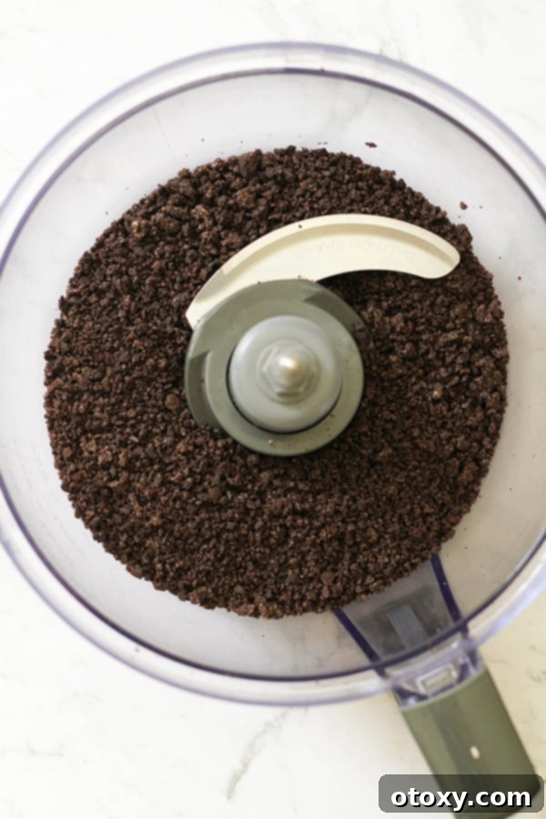 Creamy Oreo Cheesecake Truffles 5 Oreo crumbs in a food processor.