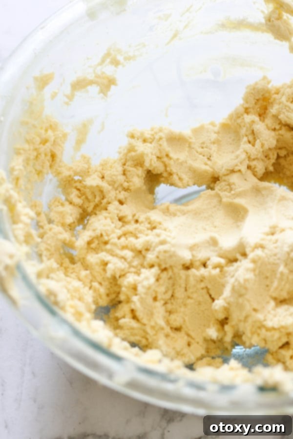 Shortbread dough mixed in a bowl, showcasing its consistent texture.
