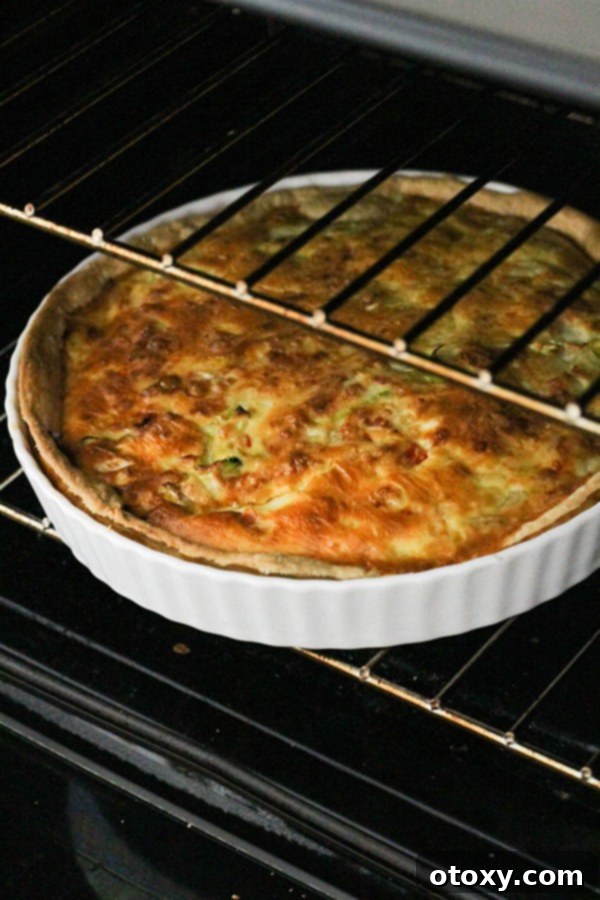 Fresh Garden Quiche 11 A delicious vegetarian quiche baking to golden perfection in the oven.