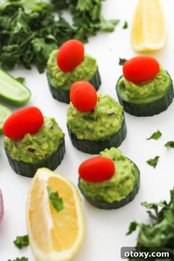 cucumber bites on a white table.