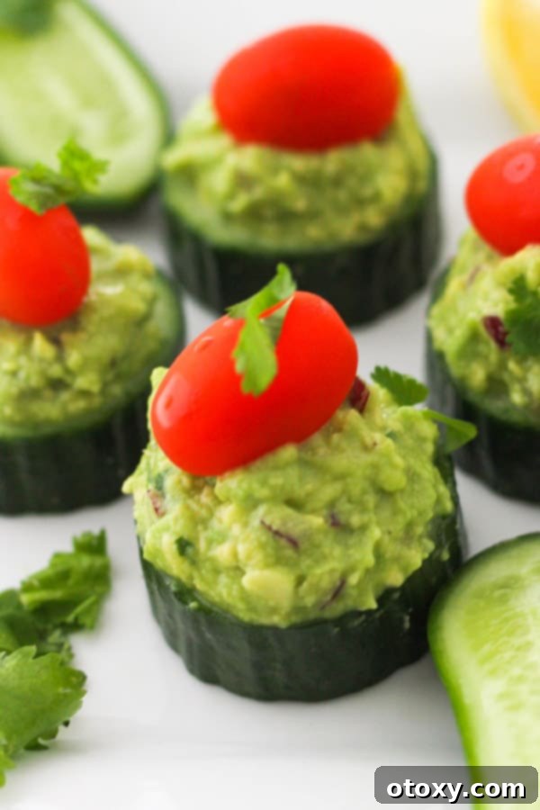 cucumber bites on a white table.