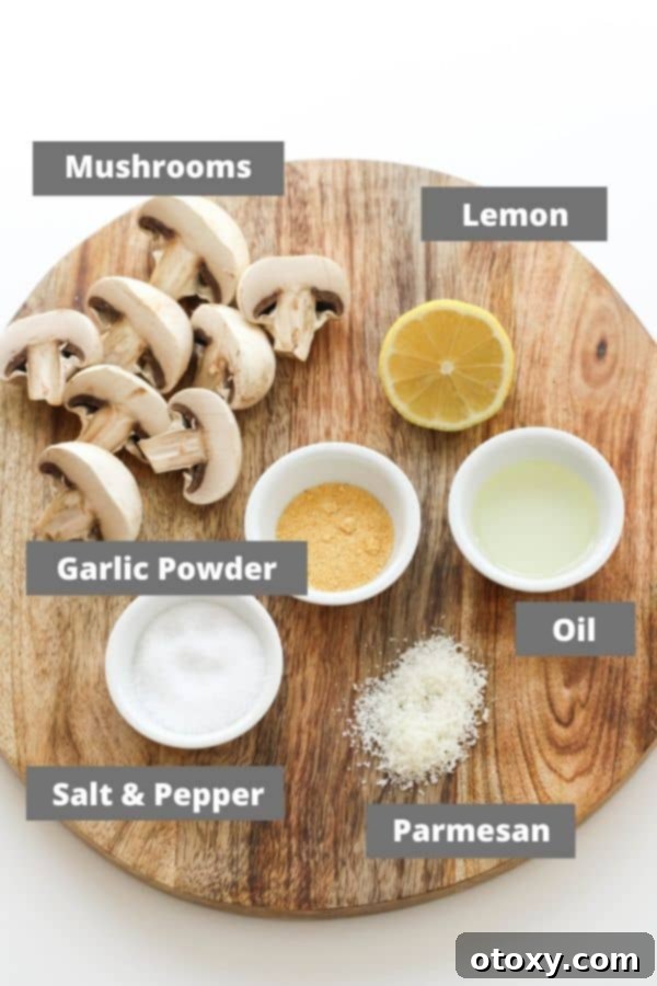 Crispy Air Fried Mushrooms 4 Ingredients laid out for making air fryer mushrooms: olive oil, various mushrooms, garlic powder, salt, pepper, lemon, extra virgin olive oil, and Parmesan cheese.